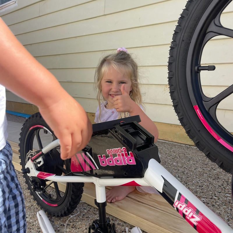 Setting up the side stand for the Zippi Rippa 16" Bike