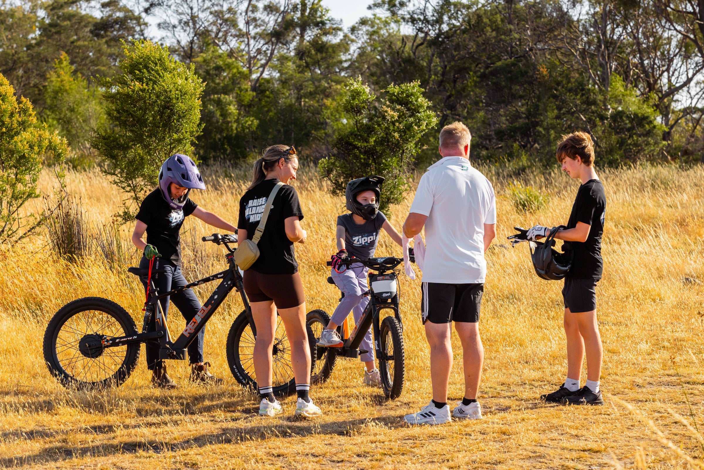 A young rider on a Zippi Rippa carving the local pump track.