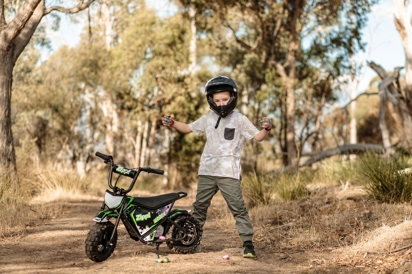 child in bush setting with zippi ebike